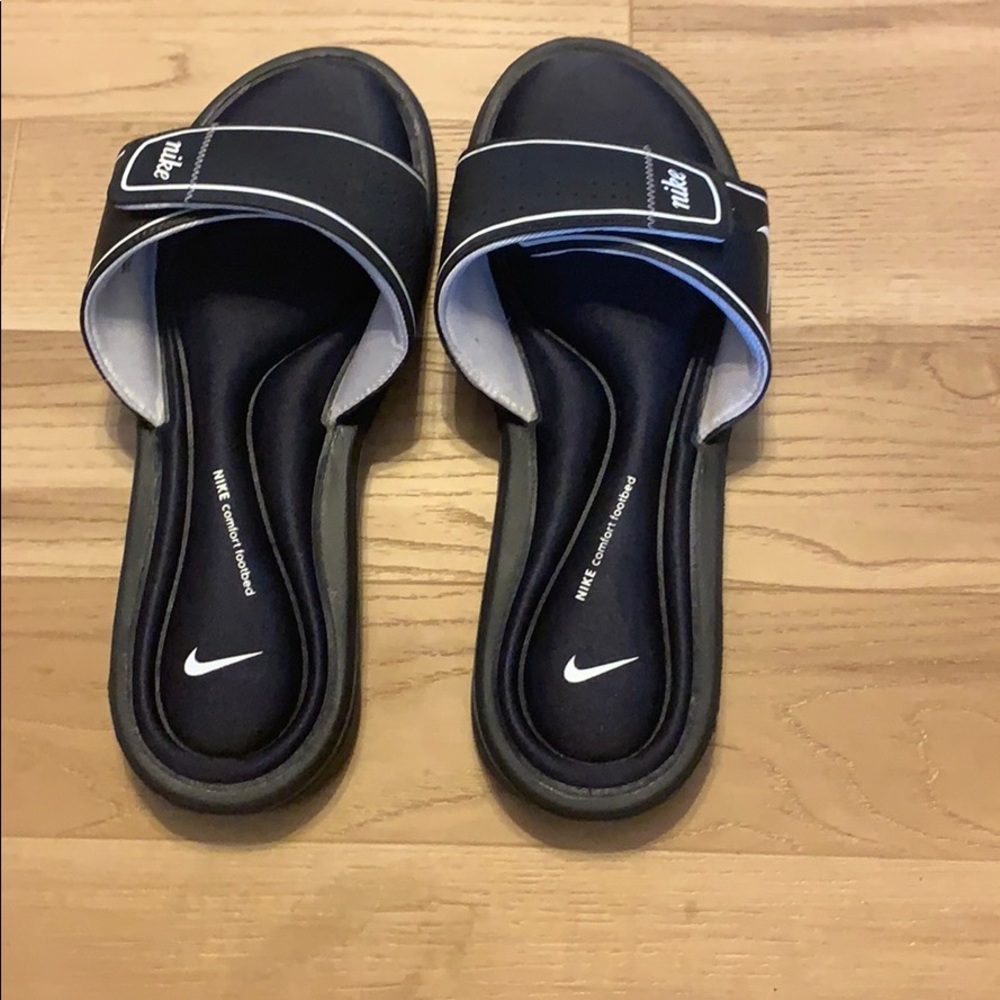 Nike slides.